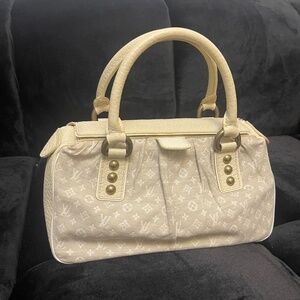 Louis Vuitton Mini Lin Trapeze hand bag